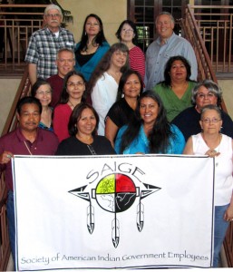 SAIGE 2012 Board of Directors L-R, Top Row: Les Tate, Elder; Shana Barehand, Becky Lewis, Danny Garceau. Next Row: Phil Hamel, Lori WIndle, Veronica Vasquez; Next Row:Sue Marcus, Brenda Takes Horse, Millie Titla, Fredericka Joseph. Front Row: Pete Molina, Sue Morris, Susan Johnson, Jinny Shulenberger. SAIGE Board Photo taken June 8, 2012 in Broomfield, CO.
